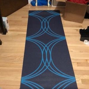 Never before used yoga mat.